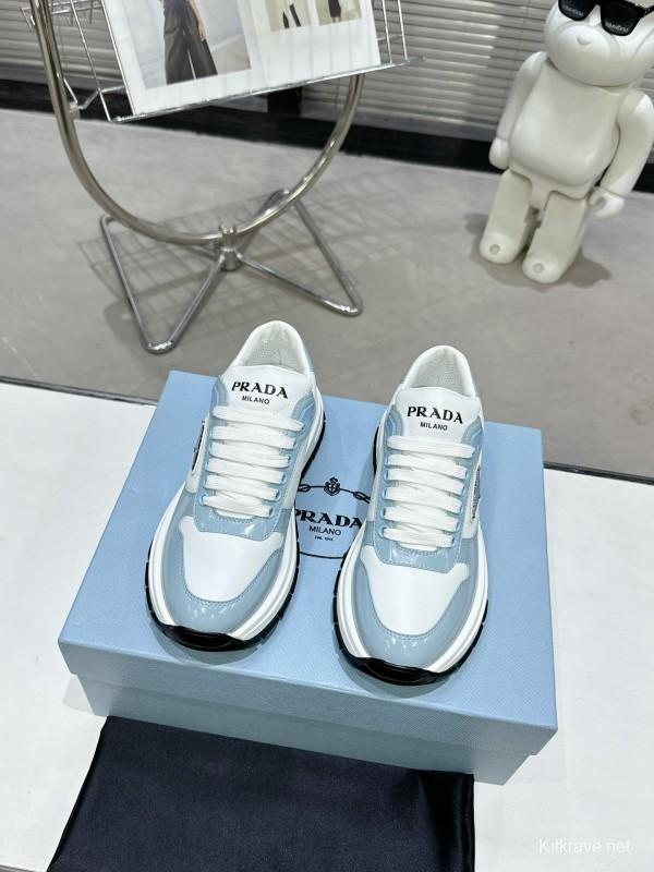 2025 Women Prada Light Blue White Leather Sneakers KFY00310