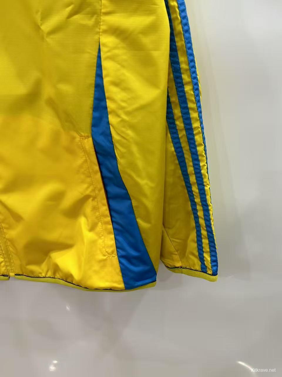 25/26 Real Madrid Yellow/Navy Reversible Windbreaker